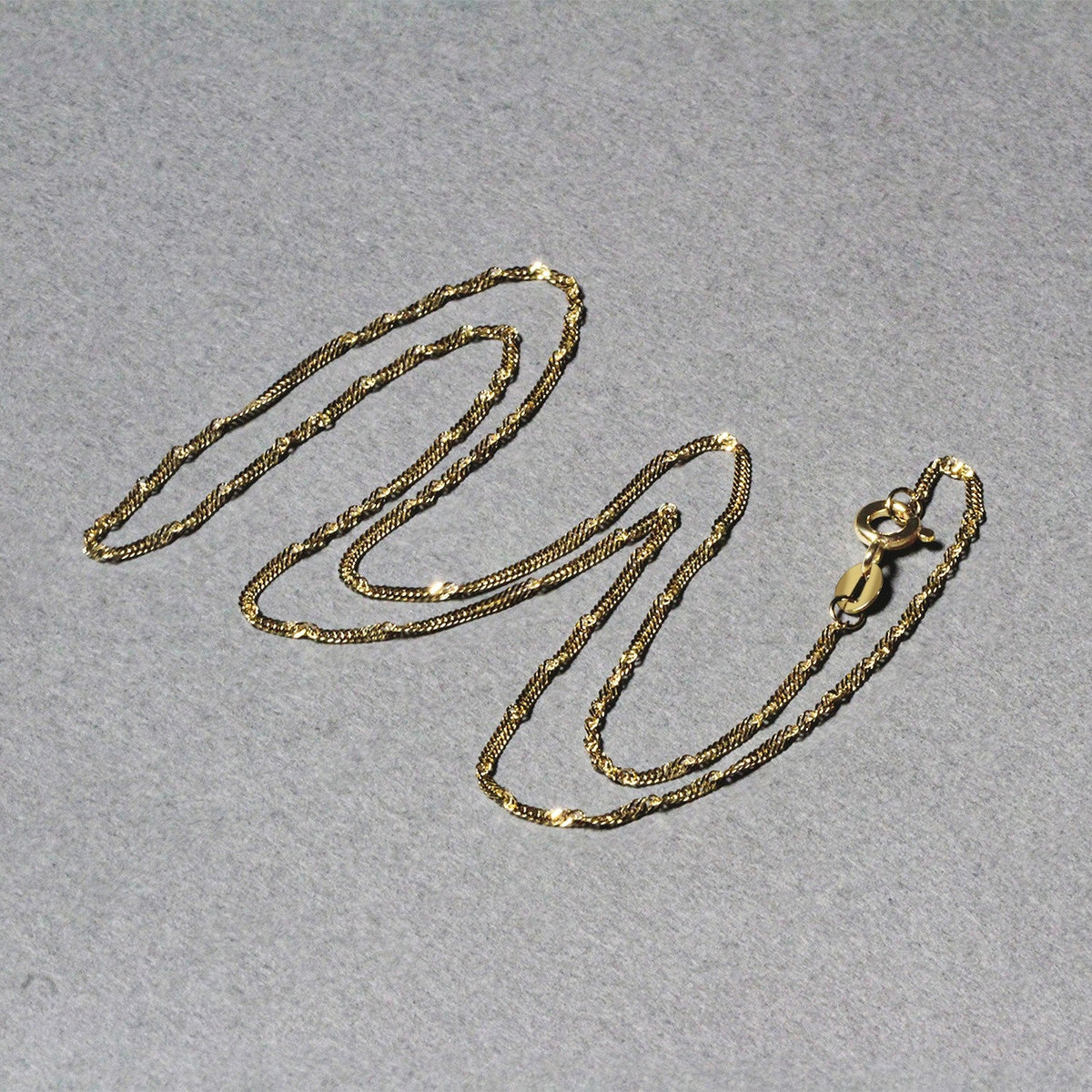 Cadena Singapur de oro amarillo de 10k (1.50 mm)