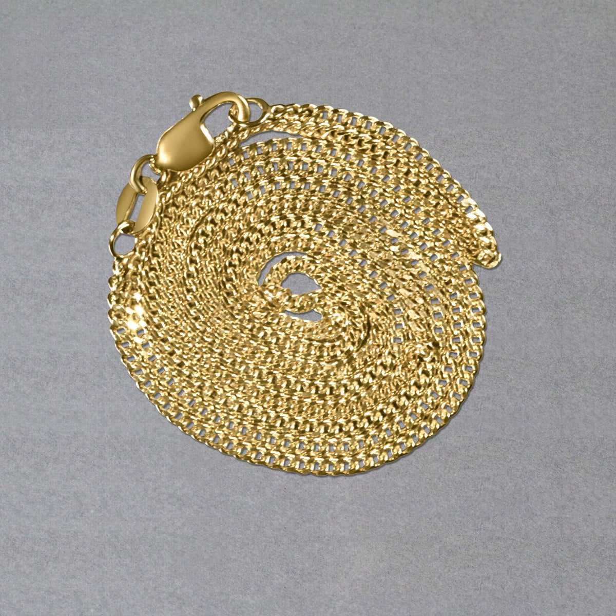 Cadena tipo gourmette de oro amarillo de 14 quilates (1.40 mm)