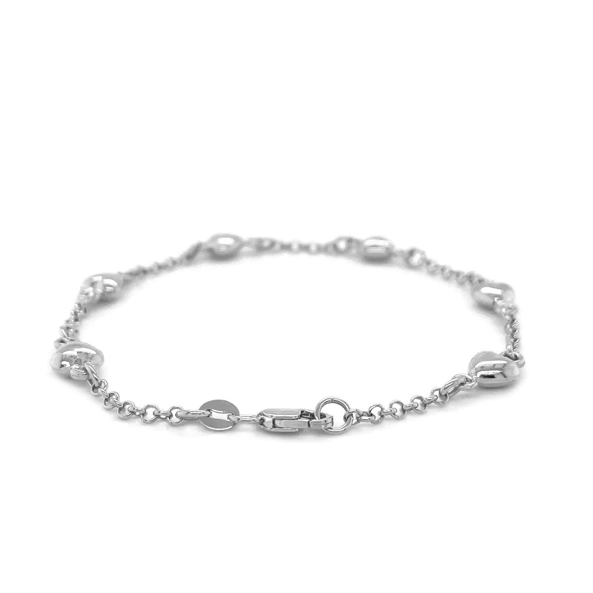 Pulsera de cadena Rolo de oro blanco de 14 quilates con estaciones de corazones inflados