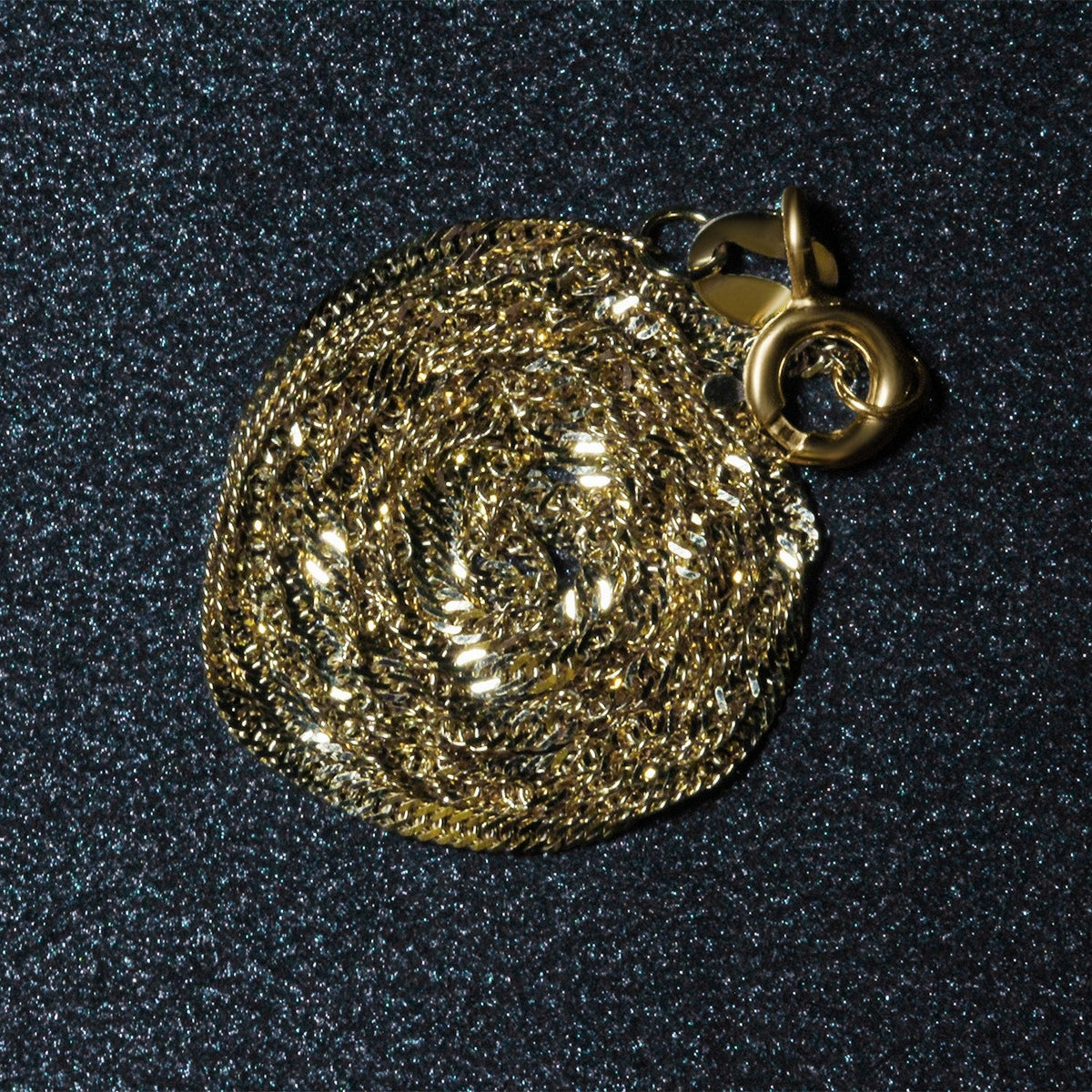 Cadena Singapur de oro amarillo de 14 quilates (1,30 mm)