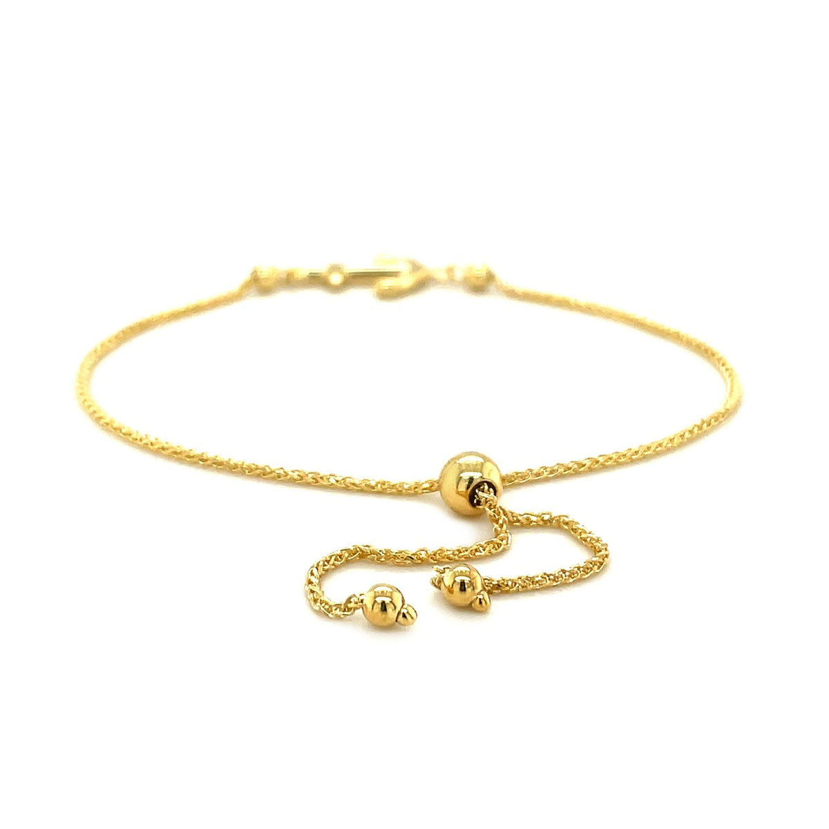 Pulsera estilo lazo ajustable con diseño de ancla en oro amarillo de 14k