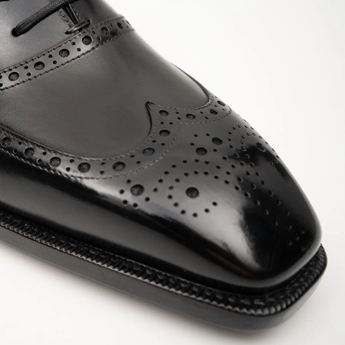Glossy Wingtip Oxford Shoe with Tapered Squared Toe
