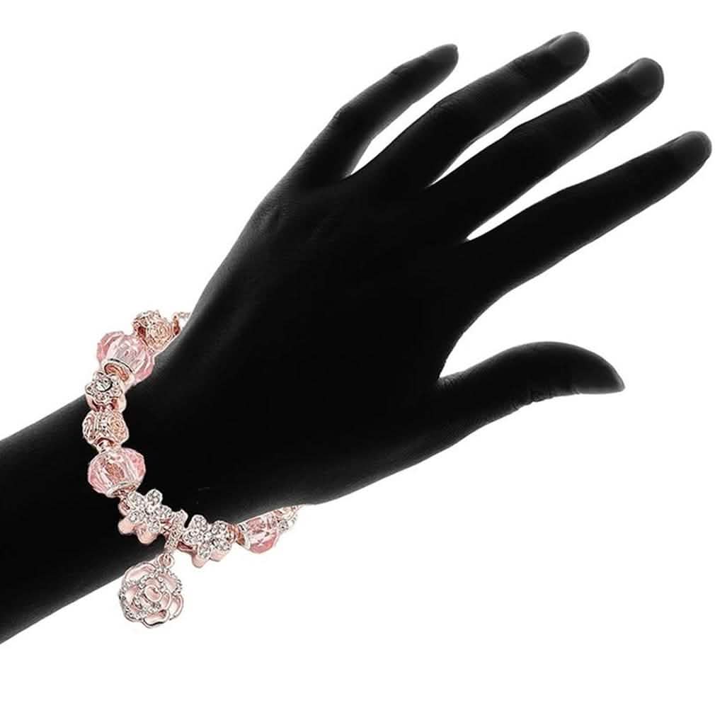 Pulsera con dijes de cristal de oro rosado de 18K hecha con elementos de Swarovski