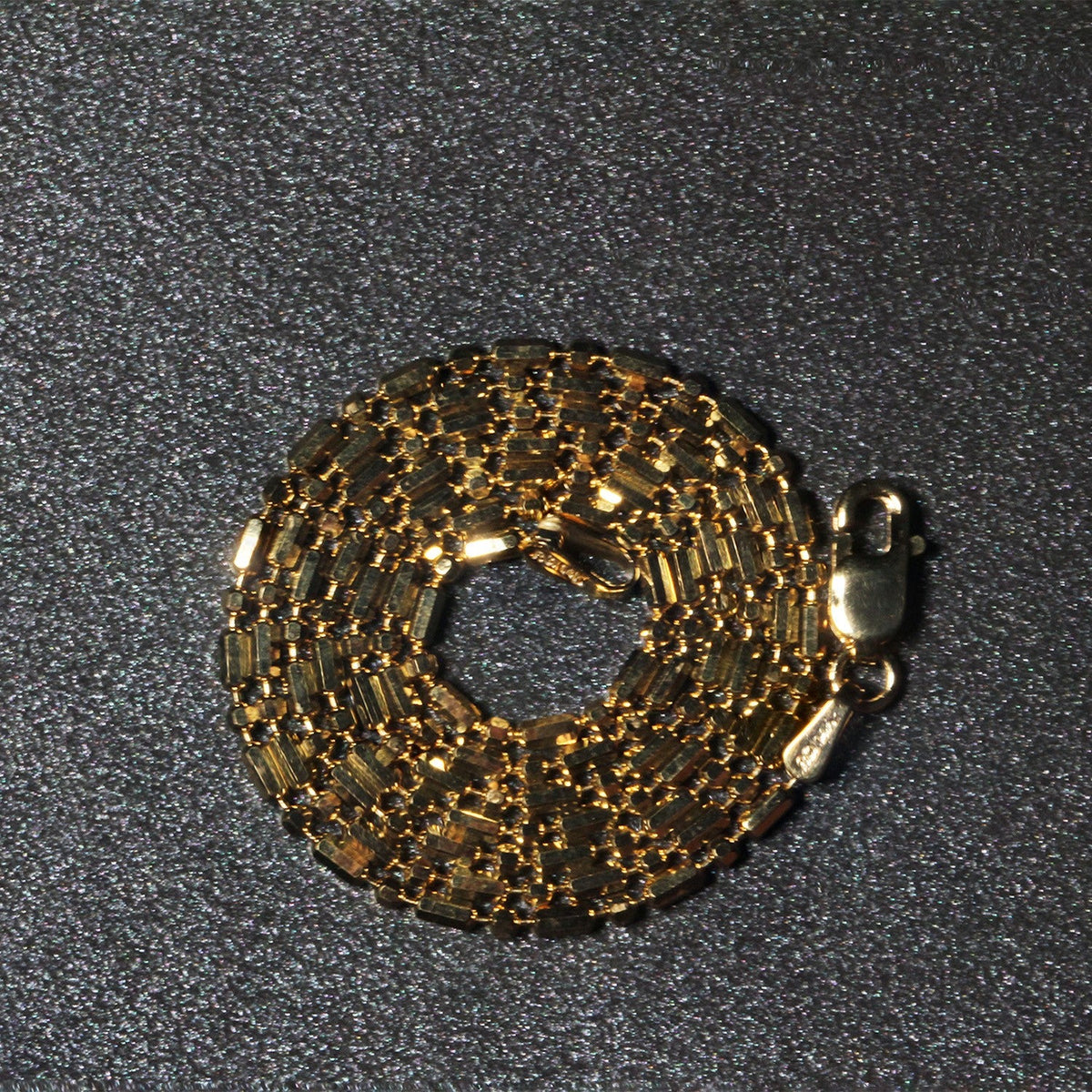 Cadena de cuentas alternadas con corte de diamante en oro amarillo de 14 quilates (1.30 mm)