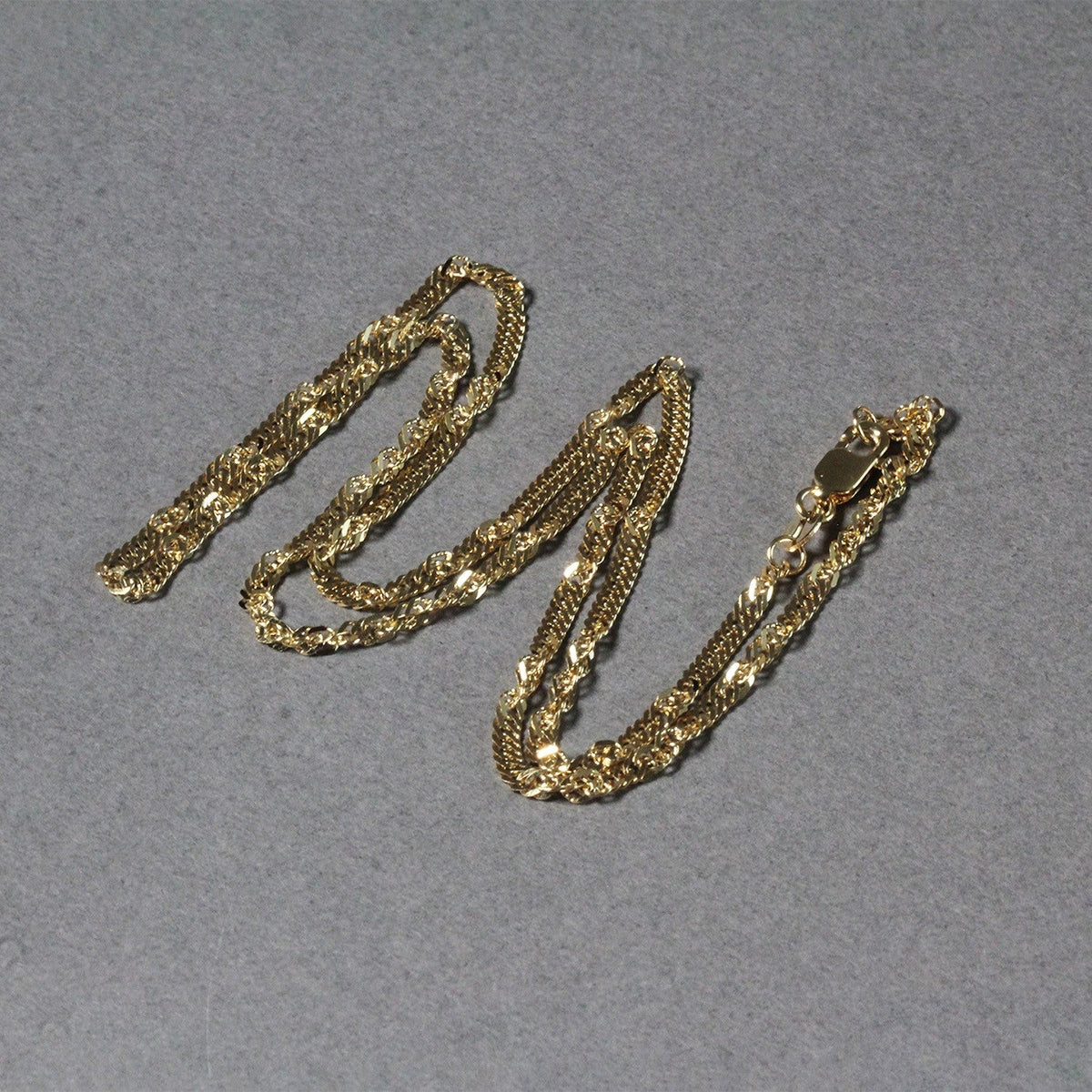 Cadena Singapur de oro amarillo de 14 quilates (2.10 mm)