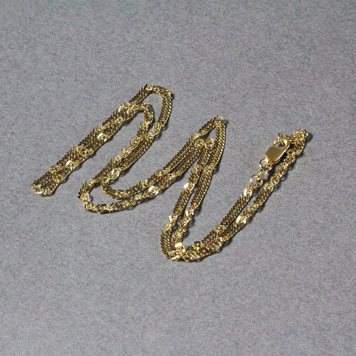 Cadena Singapur de oro amarillo de 14 quilates (2.10 mm)