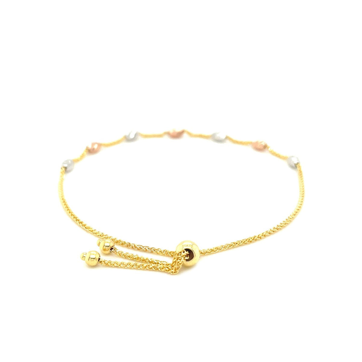Pulsera estilo lariat con estaciones ovaladas texturizadas en oro tricolor de 14k