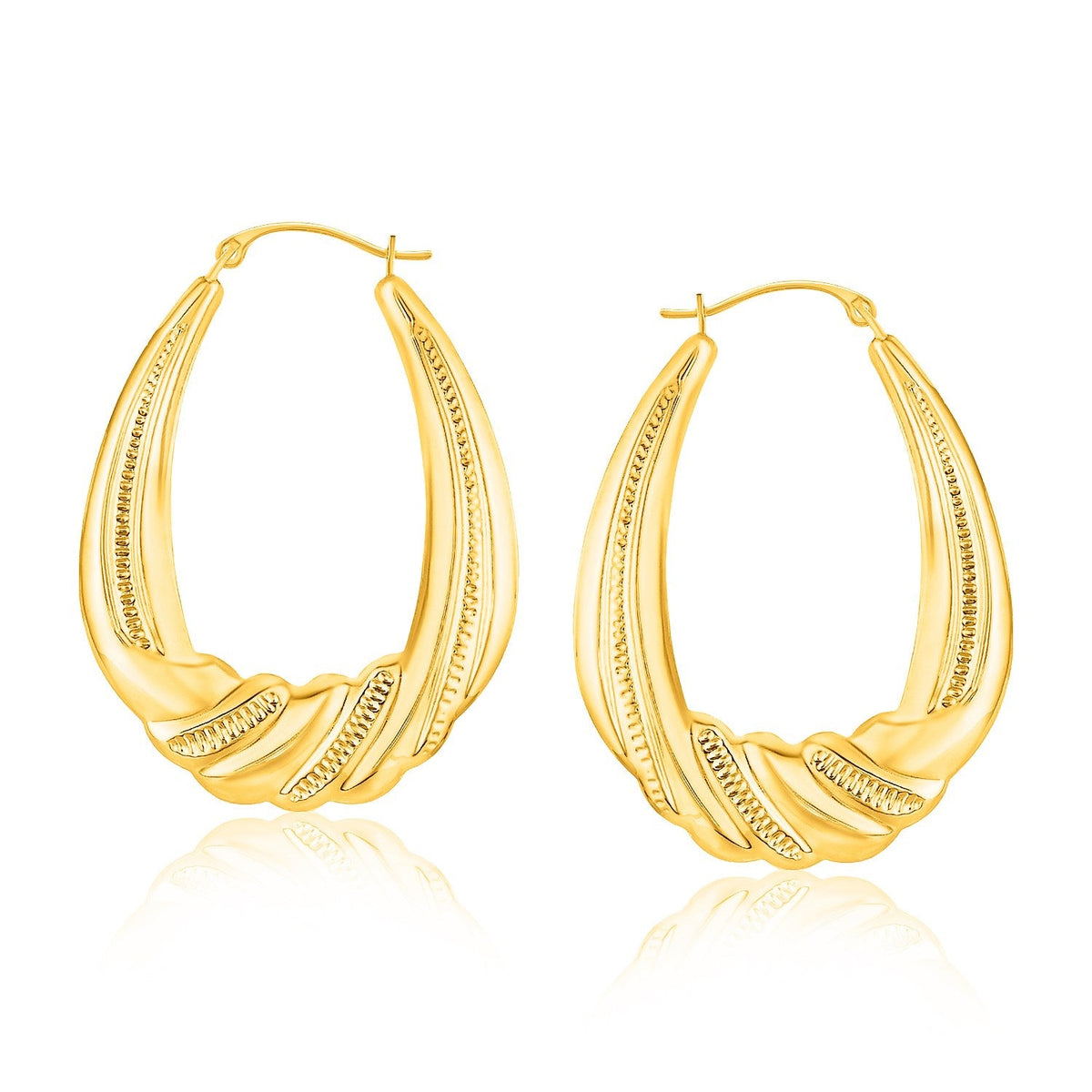 Pendientes de aro ovalados con textura graduada en oro amarillo de 14 quilates