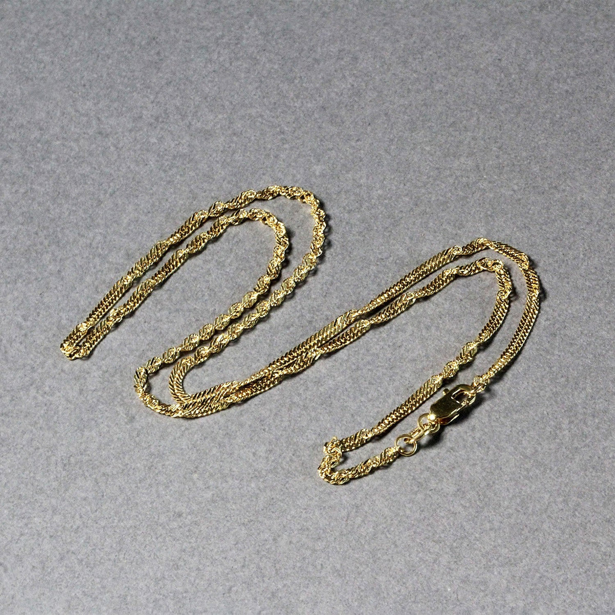 Cadena Singapur de oro amarillo de 14 quilates (1.80 mm)