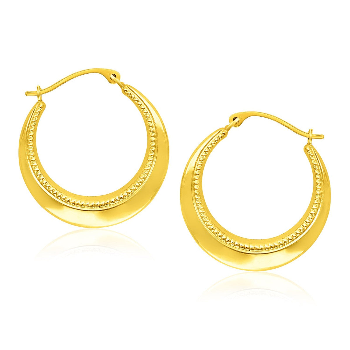 Aretes de argolla en oro amarillo de 14k con textura de cuerda redonda
