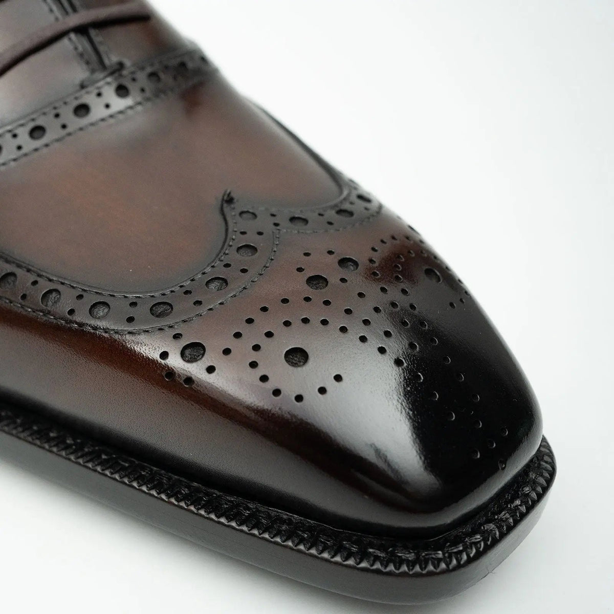 Glossy Wingtip Oxford Shoe with Tapered Squared Toe