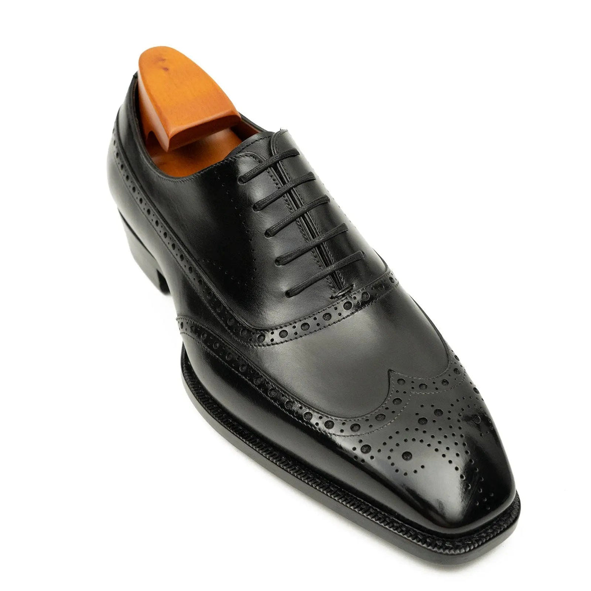 Glossy Wingtip Oxford Shoe with Tapered Squared Toe