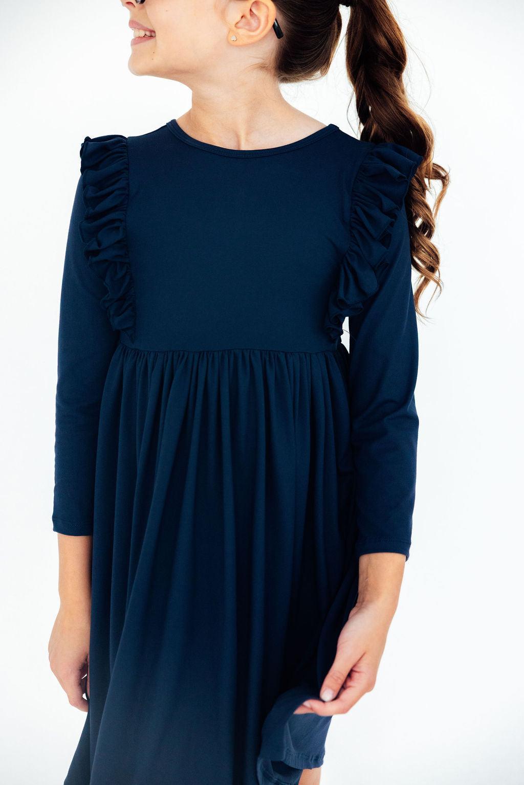 Navy L/S Ruffle Twirl Dress