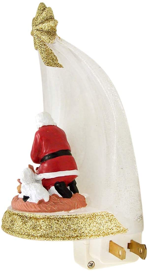 Santa Claus arrodillado ante el niño Jesús - Luz nocturna