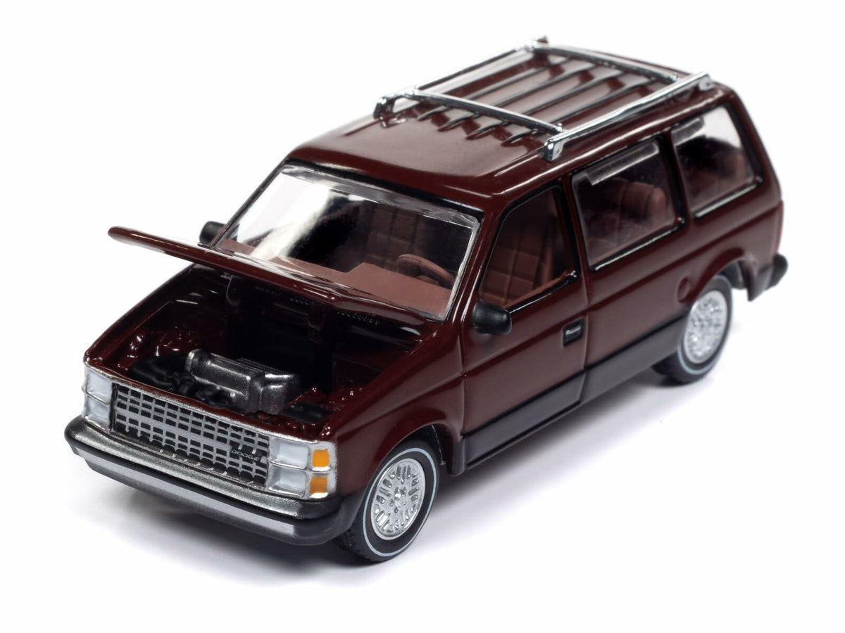 Modelo a escala 1/64 de Dodge Caravan 1985 color negro de Auto World, modelo AWSP167B