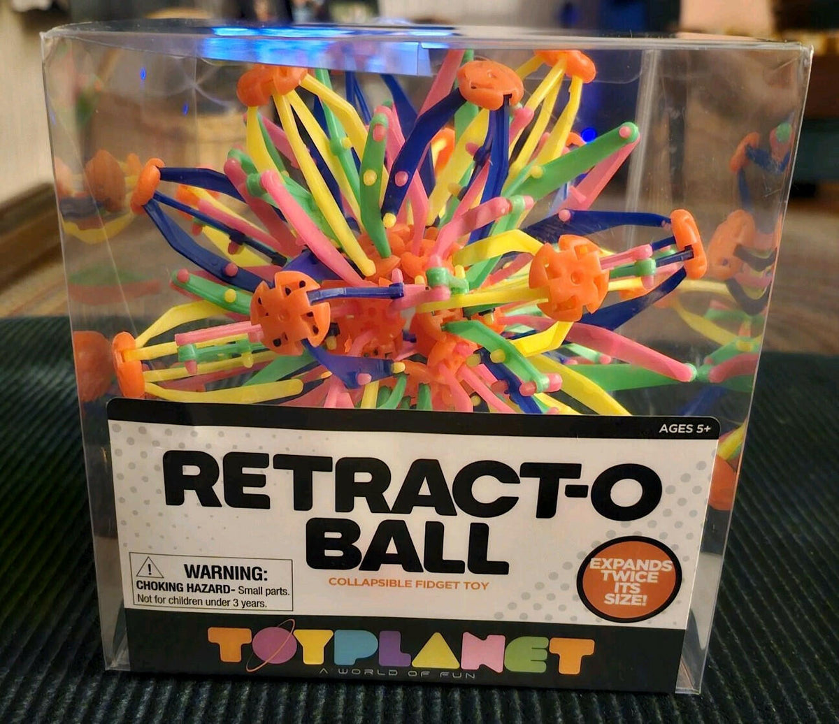 Caja abierta. Juguete antiestrés ToyPlanet Retract-O Ball de plástico retráctil multicolor
