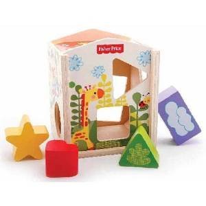 Juguete clasificador de formas de madera con bloques en casa de Fisher-Price