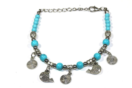 Turquoise Beaded Fish Charm Bracelet With Spiral Charms